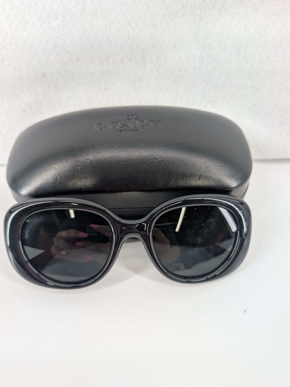 Coach HC8391U CR609 round-to-oval sunglasses with dark grey lenses